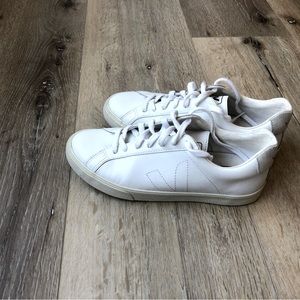 Veja leather white shoes.